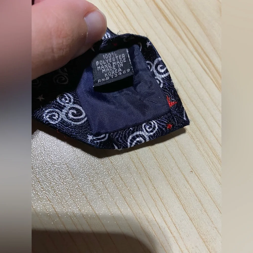 Disney Black Tie with Red and White Swirls